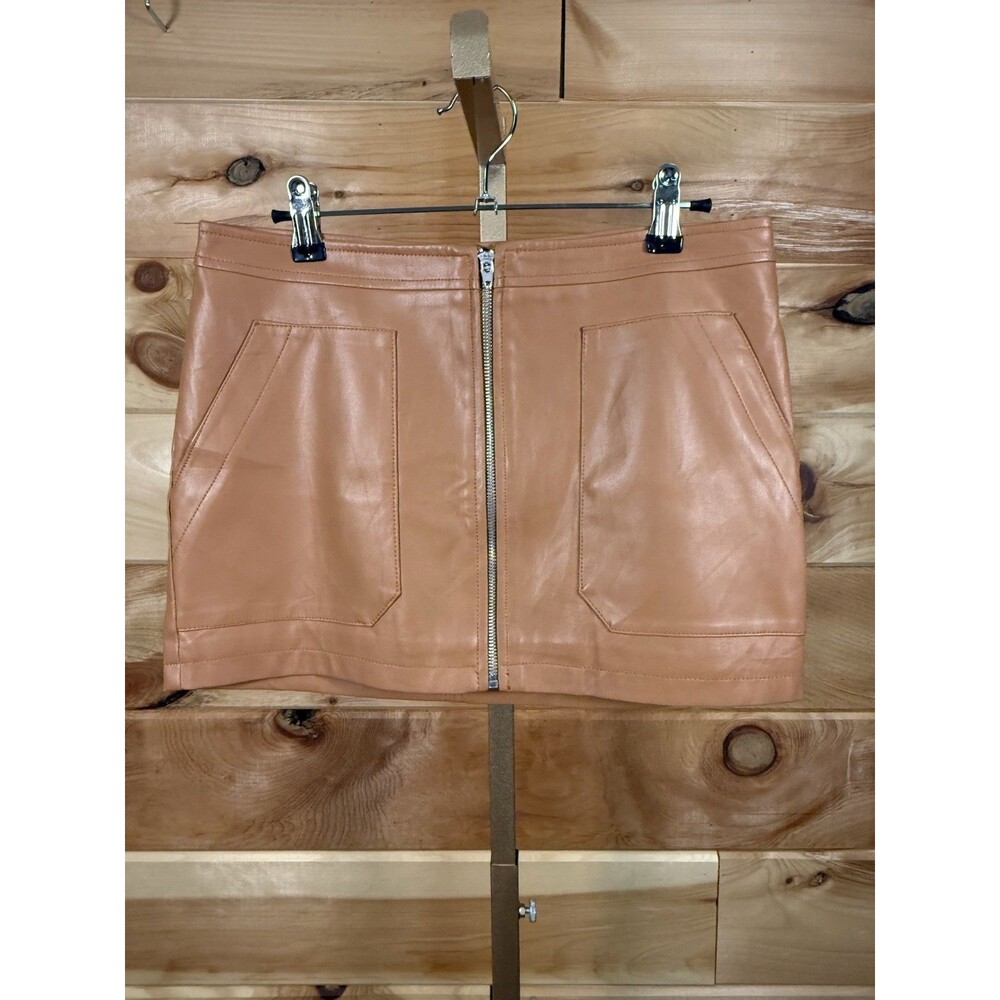 Free People faux/vegan leather mini skirt in a brown/tan color Women’s 6